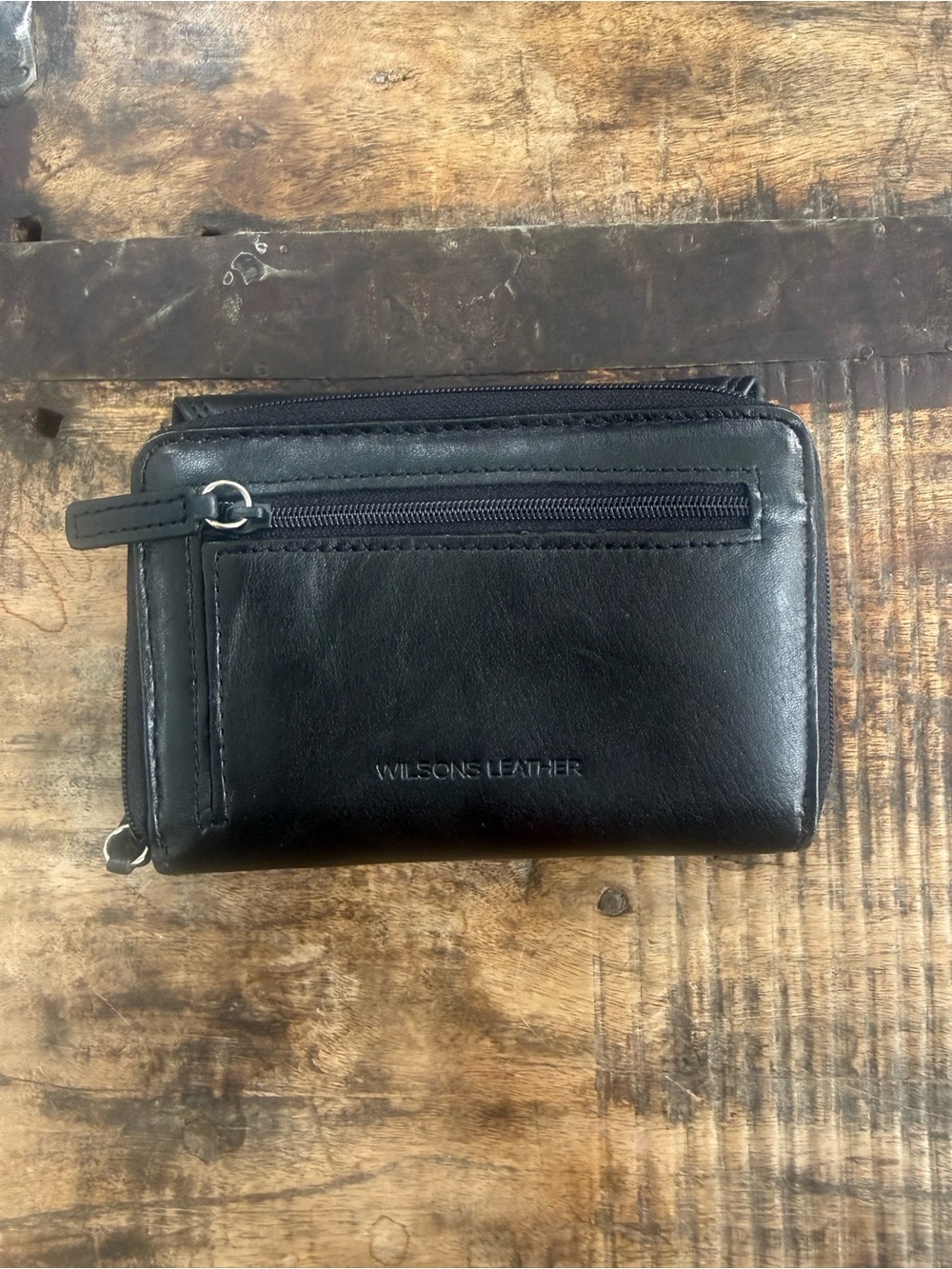 Wilson’s black leather wallet